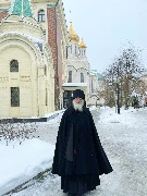 7В Сретенском монастыре Москвы на собрании архимандрит Василий