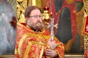 Заведующий канцелярией монастыря - игумен Алипий (Маторкин)  за Божественной литургией в праздник иконы Божией Матери "Живоносный источник".