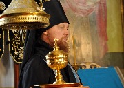 В чаше просфора приготовленная для изнесения на трапеу с Чином о Панагии.